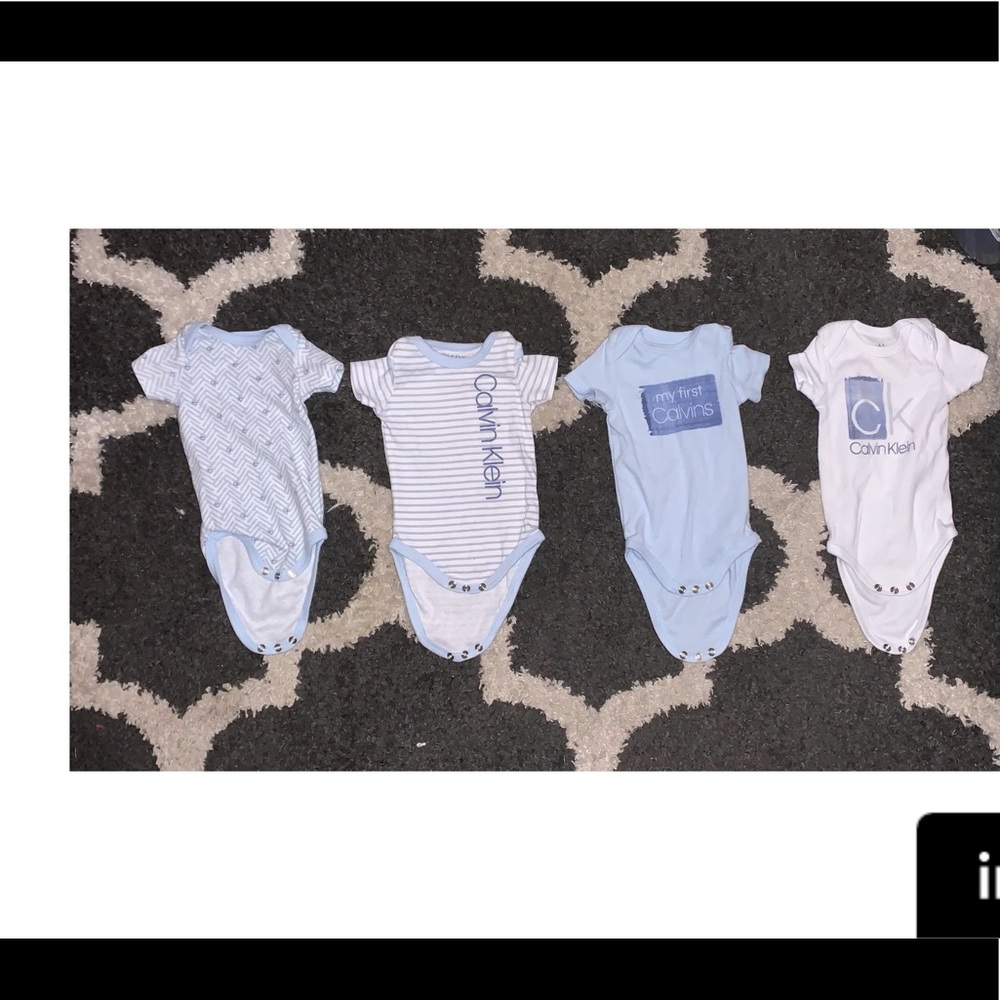 4 Calvin Klein onsies